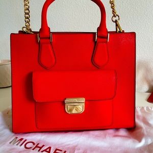 Red used Michael Kors handbag